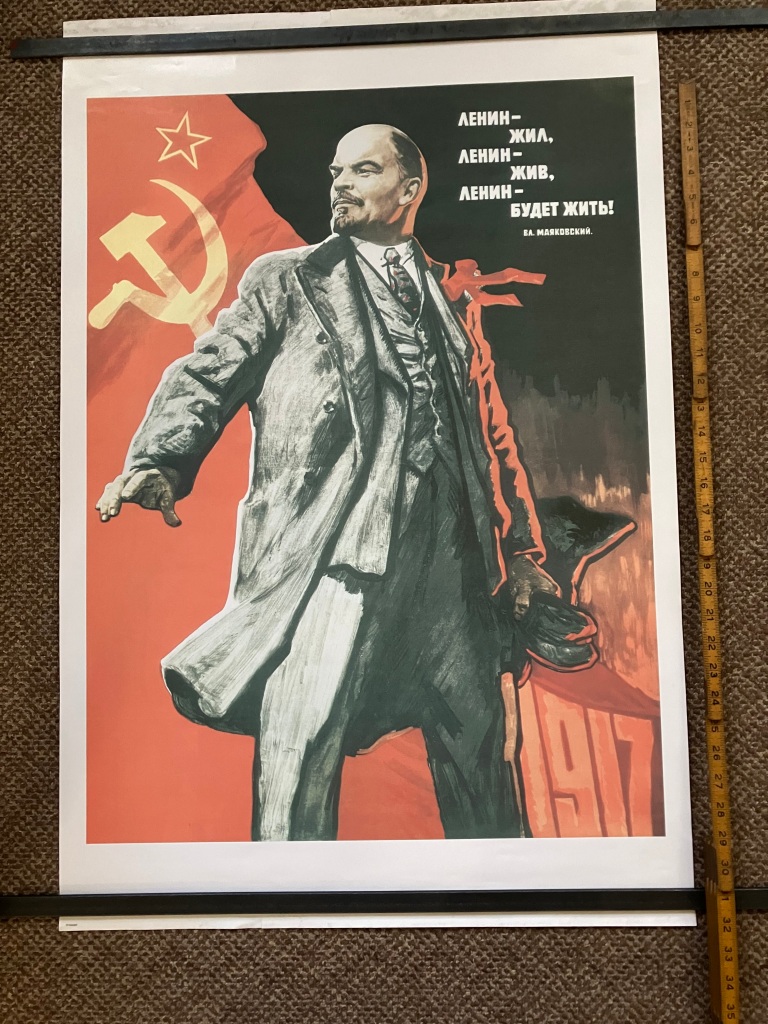 2.	V.I. Lenin with Soviet flag 24”x36”.  Mint condition.  Starting bid $50 Increase by $5 

Russian translation: “Lenin lived, Lenin lives, Lenin will live”