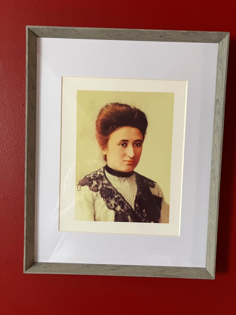 4.	Photographic print of Rosa Luxemburg, frame 12”x14 ½”. Excellent condition.  Starting bid at $45 Increase by $5